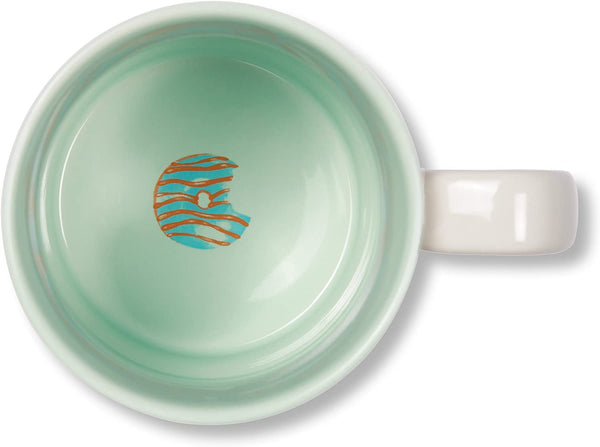 alt="White and mint green frankly I donut care mug with donut image"