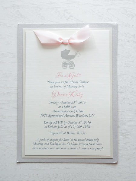 alt=“Classic invitation features ivory linen matte card stock on ivory pearlescent shimmer and grey pearlescent shimmer card stock with a grey pram and a rich pink satin ribbon bow detail”