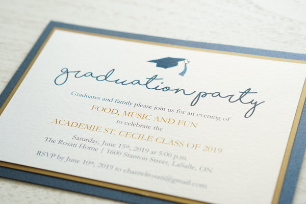 alt="Classic graduation party invitation features a white pearlescent shimmer stock on gold leaf and navy blue pearlescent shimmer card stock layers, a blue grad cap and jewel detail and a modern script font"