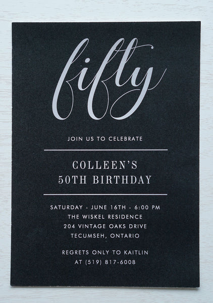 alt="Modern birthday invitation features a black background printed on white matte card stock with the honouree’s age highlighted in silver"