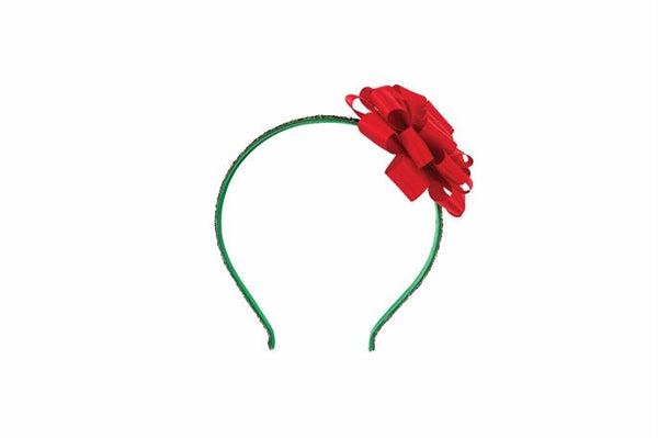alt="Green glitter headband features a satin red bow"