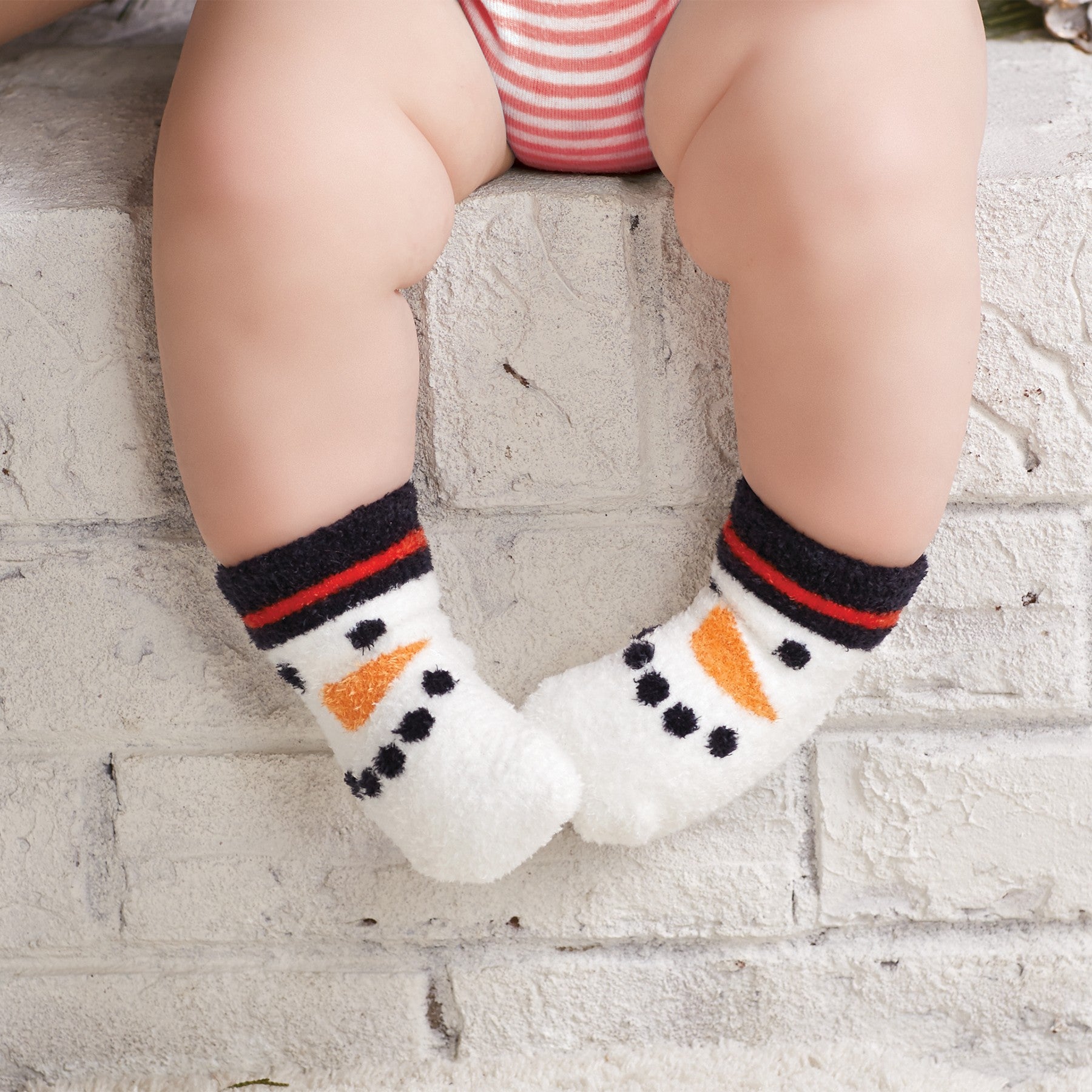 alt="These super soft cotton chenille showman socks are perfect to warm little tootsies on cold December days. 0-6 months"