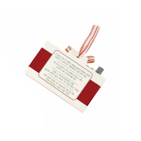 alt=“Red wooden Santa cam ornament with cotton ribbon hanger features printed poem about Santa keeping watch over the kids throughout the holiday season”