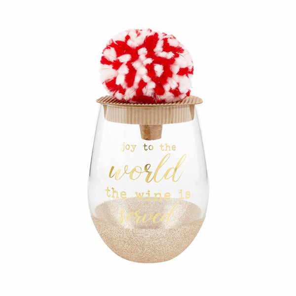 alt="Gold Christmas glitter wine glass with a gold ‘Joy to the World the wine is served’ sentiment and arrives with red and white yarn and lurex pom cork bottle stopper"