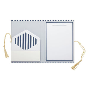 alt="Blue and white striped letter writing set with letter paper and coordinating envelopes in folder with suede cord enclosure"