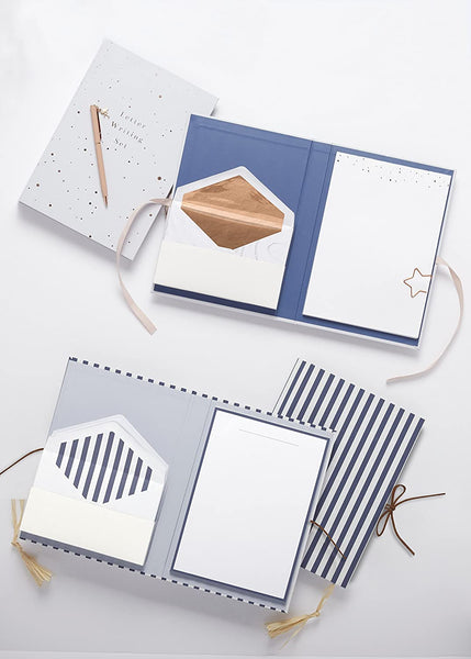 alt="blue and white striped letter writing set with letter paper and coordinating envelopes in folder with suede cord enclosure"