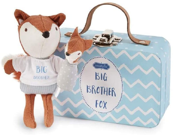 alt=“Pocket size cotton linen big brother fox features embroidered facial features, poplin tee, linen pants & velour tail, coordinating swaddled baby fox detaches with hook and loop closure in a blue fiberboard suitcase with printed nursery interior and poem on back”