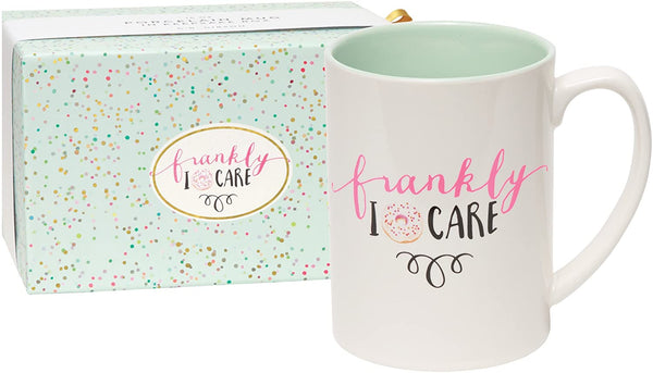 alt="White and mint green frankly I donut care mug with donut image"