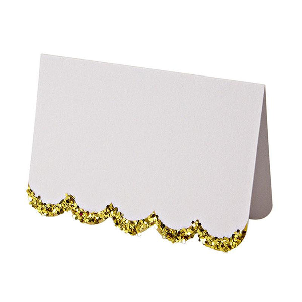 alt="White place cards with gold glitter and scallop edge"