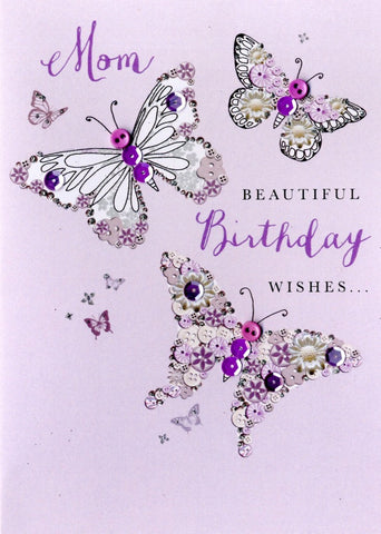 Quality hand-finished, button, sequin and glitter embellished greeting card by Second Nature sealed in a protective wrapping complete with envelope.  Message: Mom Beautiful Birthday Wishes....just for you! Wishing you a day that’s as special as you are. With lots of love. 