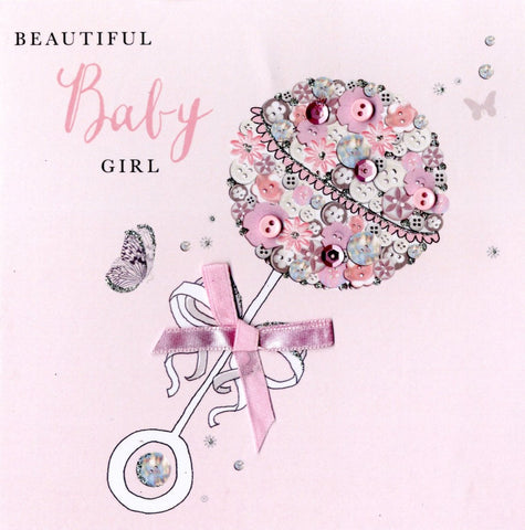 alt=“Baby Girl Rattle quality hand-finished, pink button, sequin and glitter embellished greeting card sealed in a protective wrapping complete with envelope. Message: Beautiful Baby Girl. Wishing you a world of happiness with your new arrival”