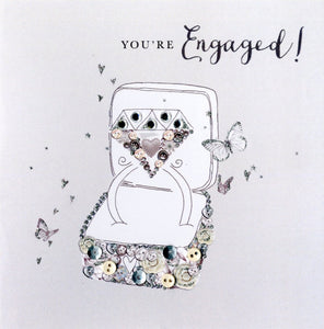 Quality hand-finished, glitter embellished greeting card by Second Nature sealed in a protective wrapping complete with envelope.  Message: ﻿Congratulations You’re Engaged! Wishing you a wonderful future together.