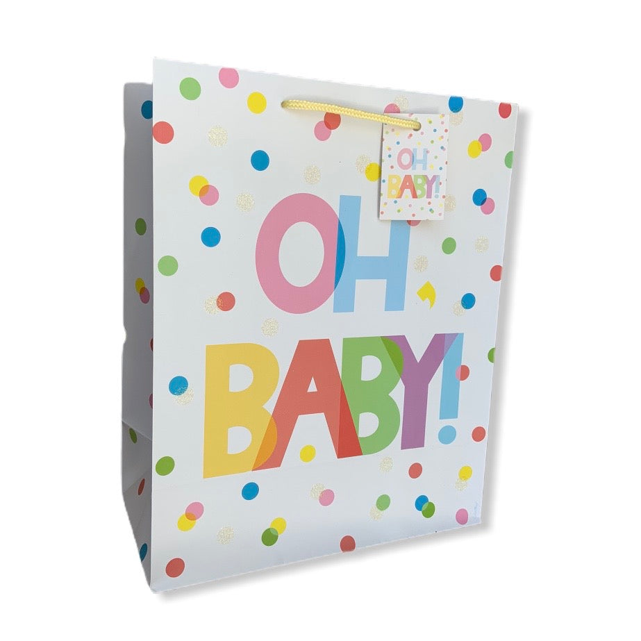 Oh, Baby! gift bag with glitter accents and an adorable polka dot pattern is the perfect packaging solution for any new arrival.