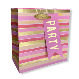 alt="Pink and gold petite embellished party gift bag with stripes"
