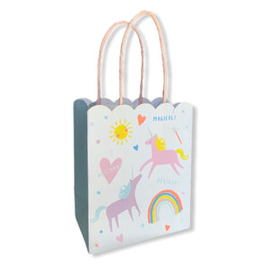 alt="Small gift bag with adorable unicorns, colourful hearts, happy suns and neon rainbows"