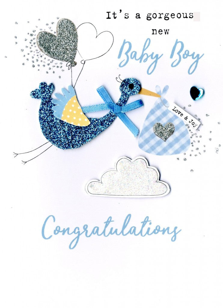 alt=“Baby Boy Congratulations Stork quality hand-finished, silver and blue glitter embellished greeting card sealed in a protective wrapping complete with envelope. Message: It's a gorgeous New Baby Boy Congratulations. Enjoy every moment with your precious new arrival”
