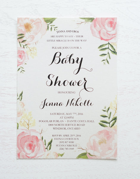 alt=“Elegant baby shower invitation features quartz, pearlescent shimmer card stock with a modern font and pretty pink watercolour florals”