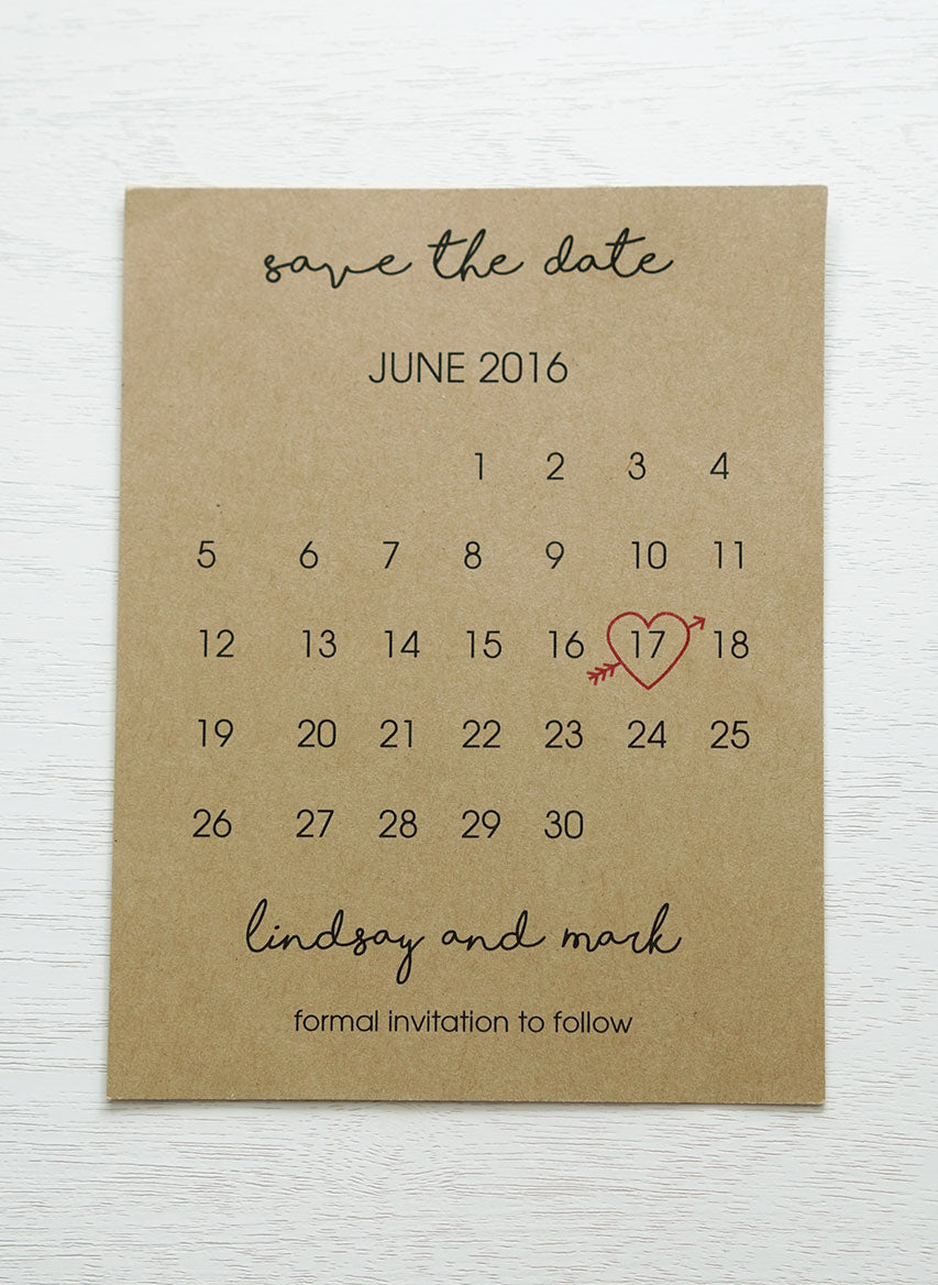 alt="Rustic calendar save the date card is printed on a kraft card stock and features your wedding month/day highlighted with a red heart"