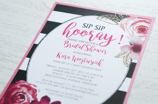 alt="Chic striped floral Bridal Shower invitation features a matte white card stock on a bright pink pearlescent shimmer stock, a black and white striped background with oval frame and a watercolour floral and faux glitter leaf design"