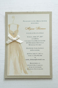 alt="Elegant Bridal Shower invitation features an ivory pearlescent shimmer card stock on a gold leaf pearlescent shimmer stock, a beautiful gold watercolour wedding dress design complete with jewel detail and a rich satin ivory ribbon bow to finish it off"