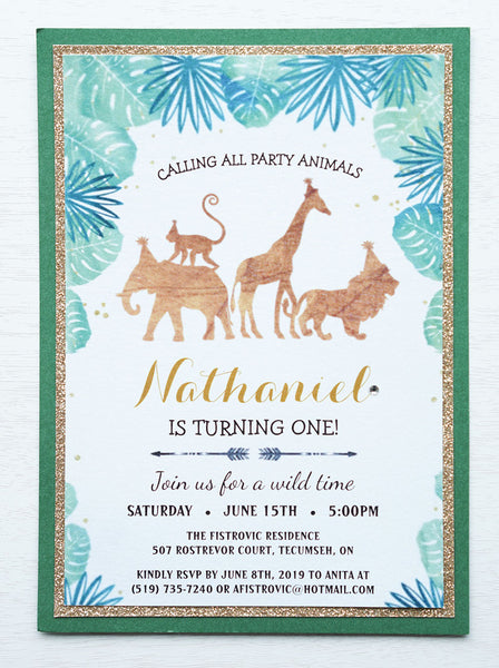 alt="Wild One birthday party invitation features a white pearlescent shimmer stock on gold glitter and green pearlescent shimmer card stock layers, a fun gold jungle animal design and palm pattern with a jewel accent on the honourees name"