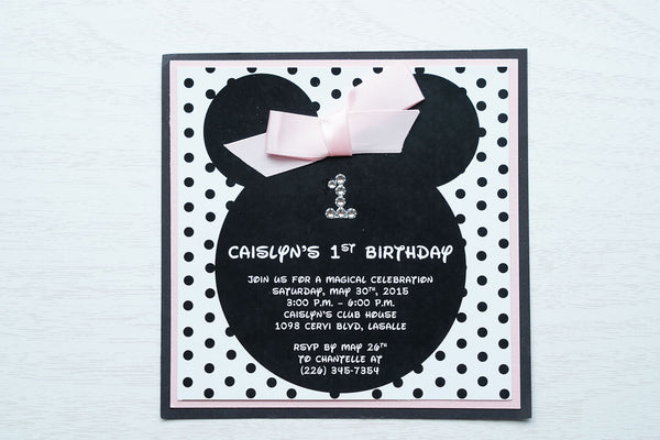 alt="Fun Disney inspired birthday party invitation features a matte white stock on light pink pearlescent shimmer and matte black card stock layers, Minnie Mouse ears, an elegant jewel age detail, a black polka dot background and is finished off with a rich pink ribbon bow to match"