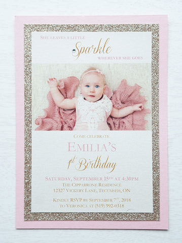 alt="Elegant photo birthday party invitation features an ivory pearlescent shimmer stock on rose gold glitter and pink pearlescent shimmer card stock layers, a photo of the honouree and 'She leaves a little sparkle wherever she goes' sentiment with jewel detail"