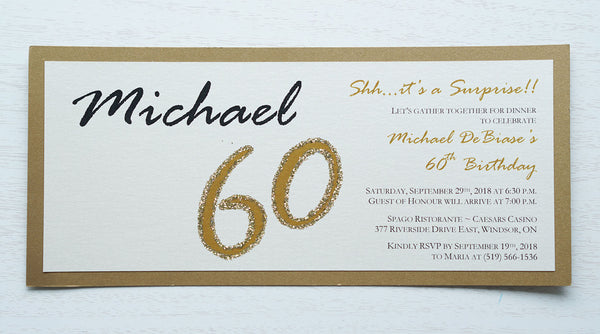 alt=“Modern and fun tea length birthday invitation features an ivory pearlescent shimmer card stock on a gold pearlescent shimmer stock, the honouree’s name in script and their age highlighted with gold glitter sparkle”