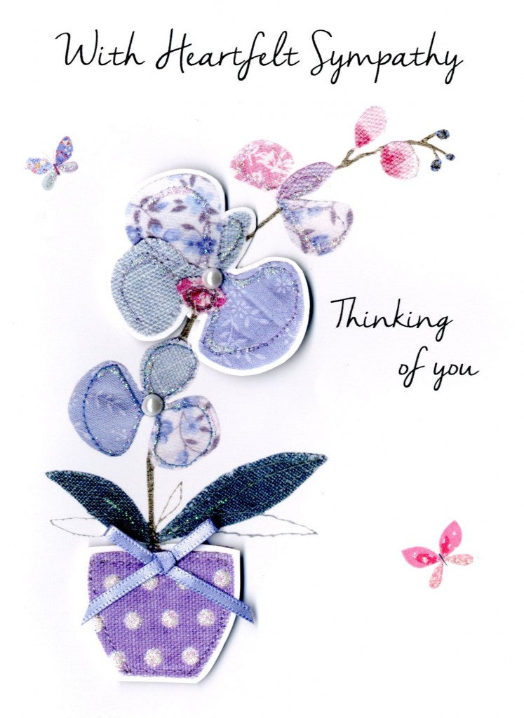 Quality hand-finished, glitter embellished greeting card by Second Nature sealed in a protective wrapping complete with envelope.  Message: ﻿With Heartfelt Sympathy. Thinking of you. May the love and thoughts of those around you comfort you through the days ahead.