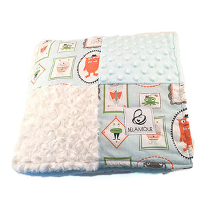 alt="Aqua and off white chenille and cotton monster minky baby boy blanket"